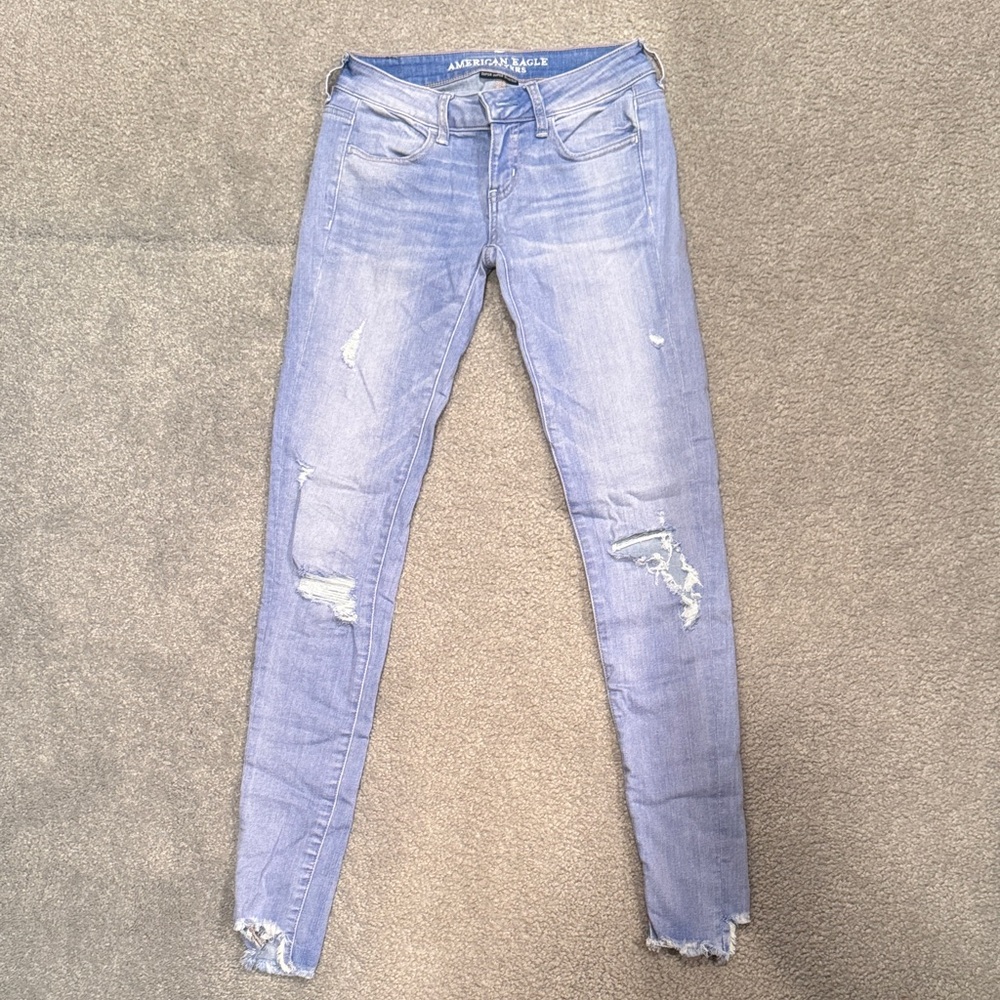 American Eagle Outfitters Women's Faded Low Rise Blue Ripped Skinny Jeans